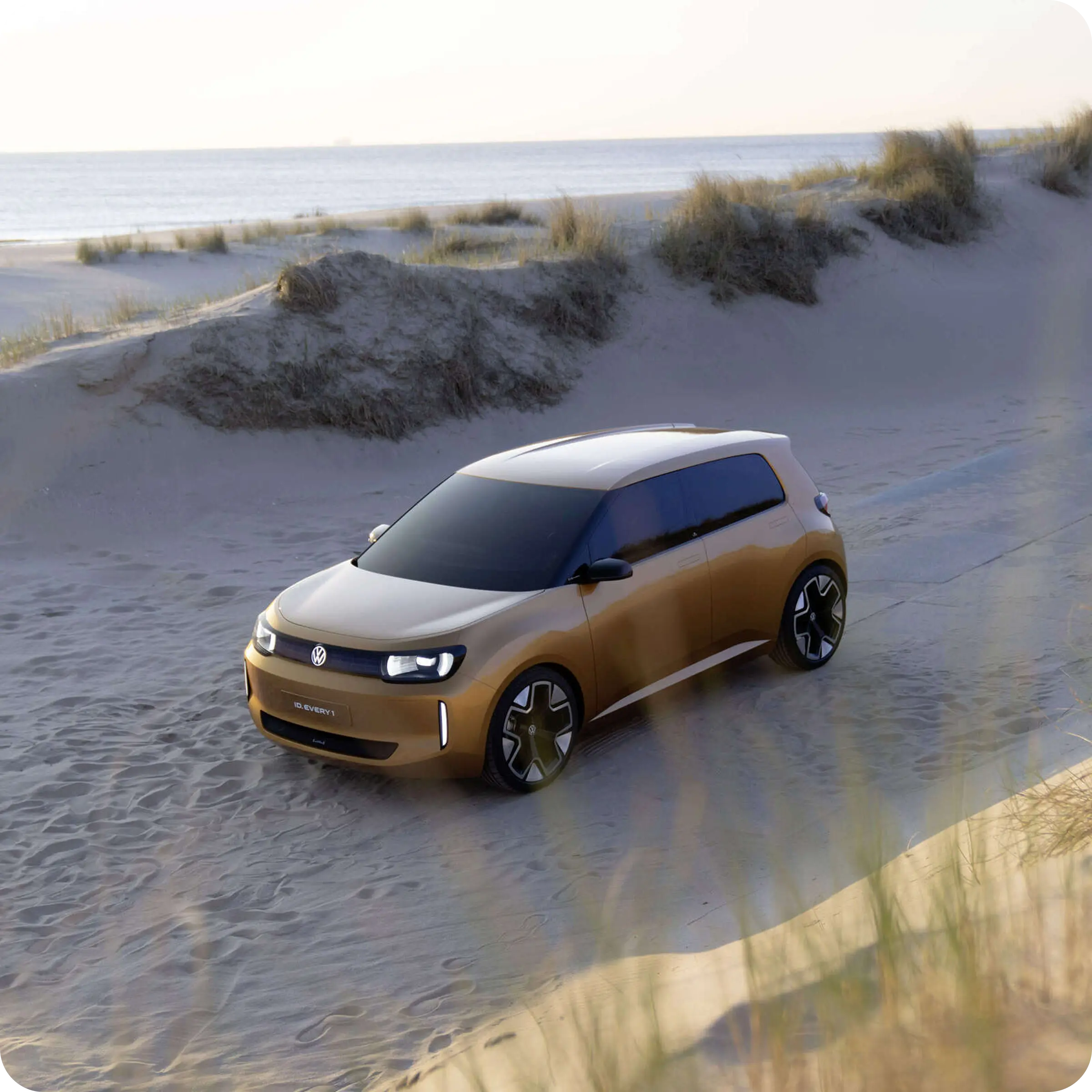 Rivian R1T driving through scenic landscape